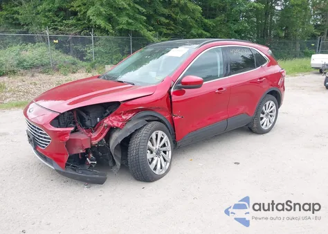 2021 Ford Escape Titanium z USA, uszkodzony, nr VIN 1FMCU9J90MUA33755